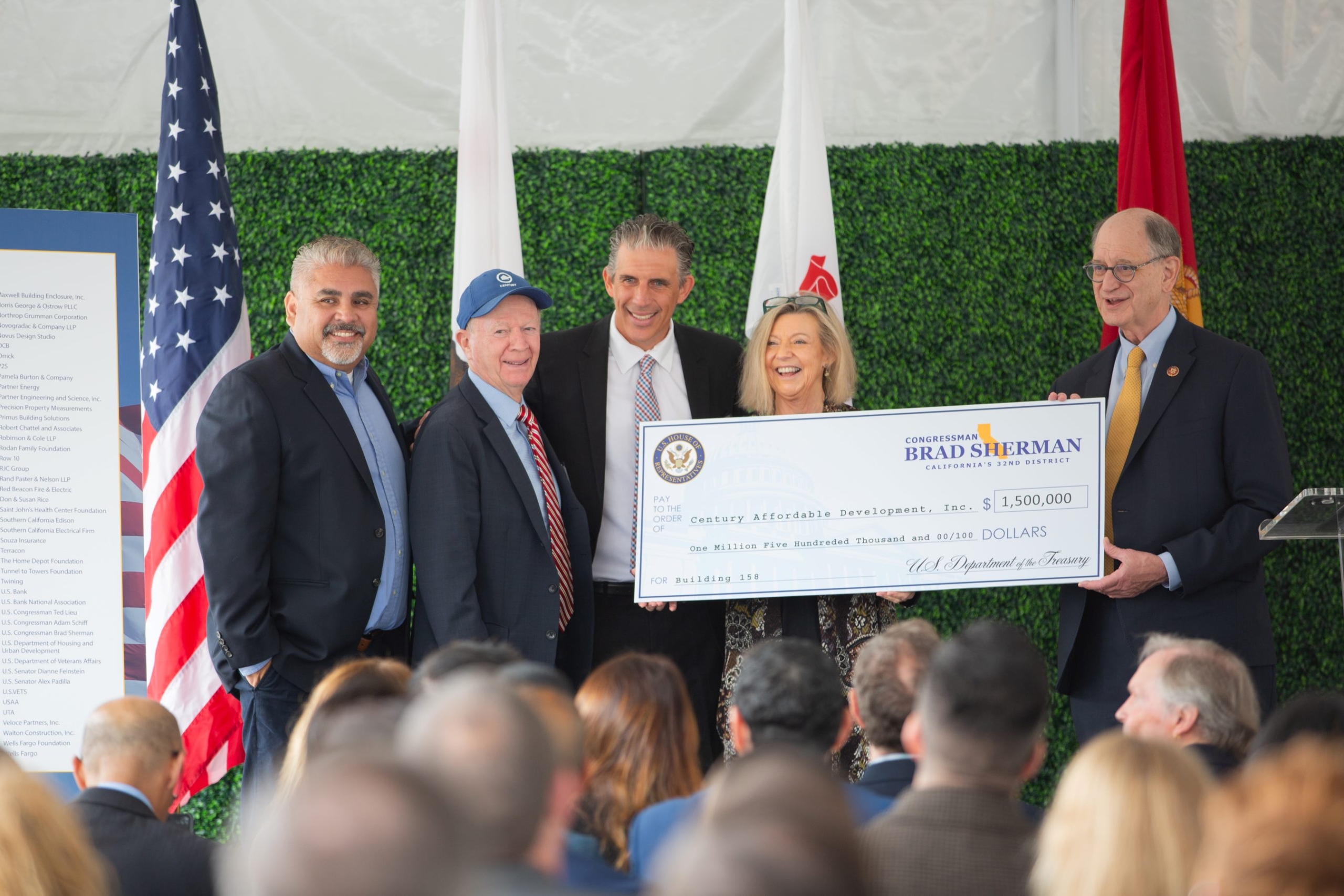 Picture of $1.5 million check being presented to VA team at ceremony from U.S. Rep. Brad Sherman